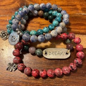 Four beaded bracelets.